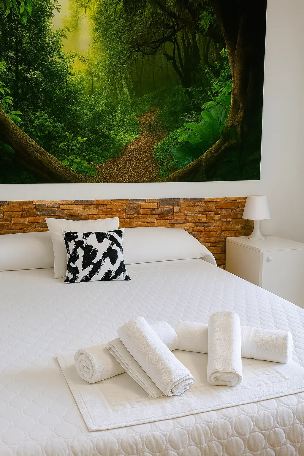 White towels on prepared bed